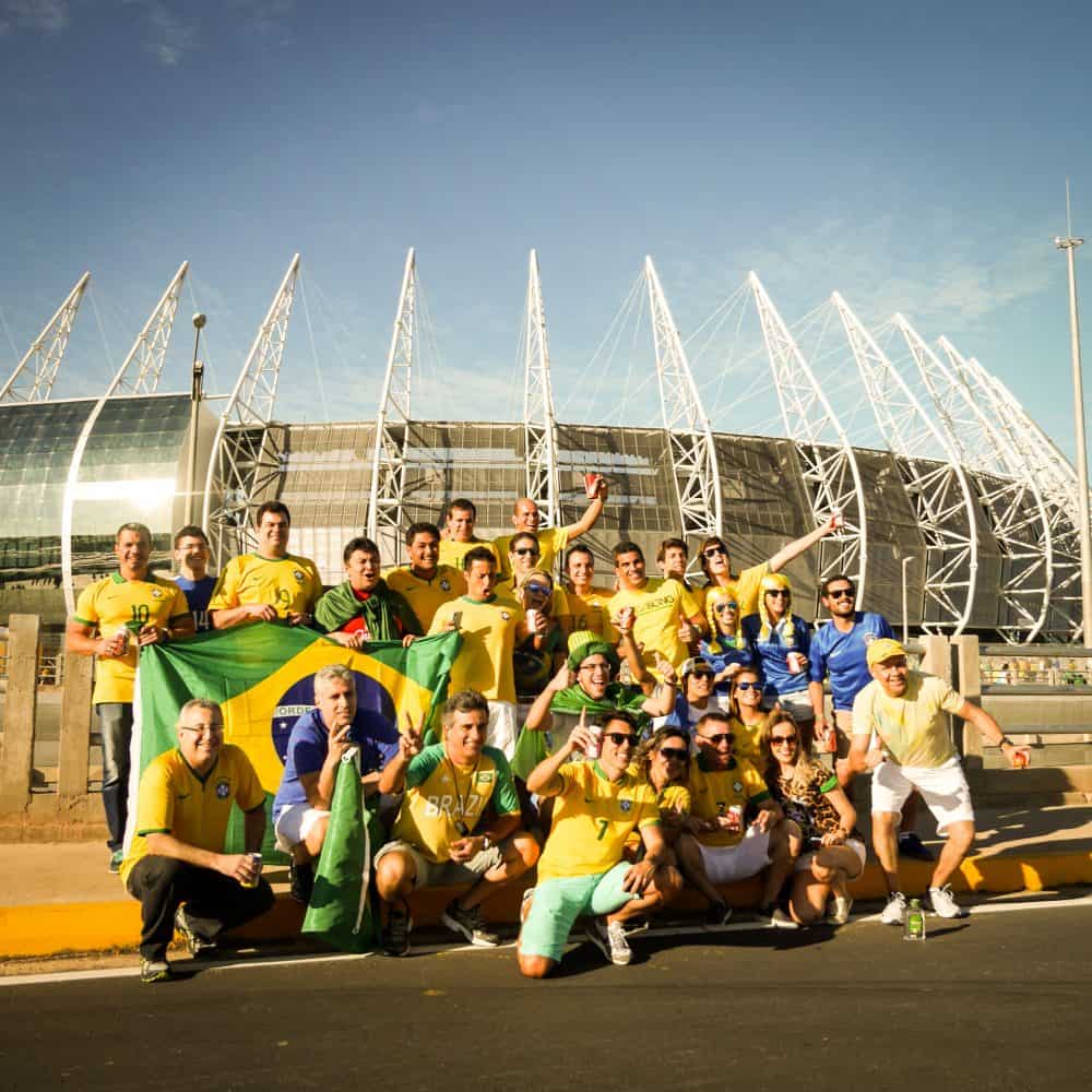 Group photo outside of world cup stadium